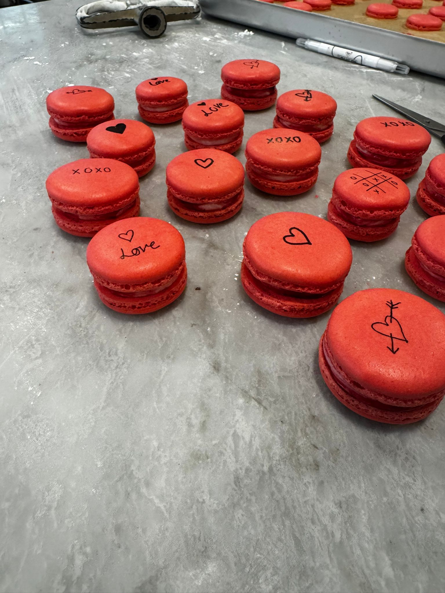 Red Valentine's day macarons with love messages